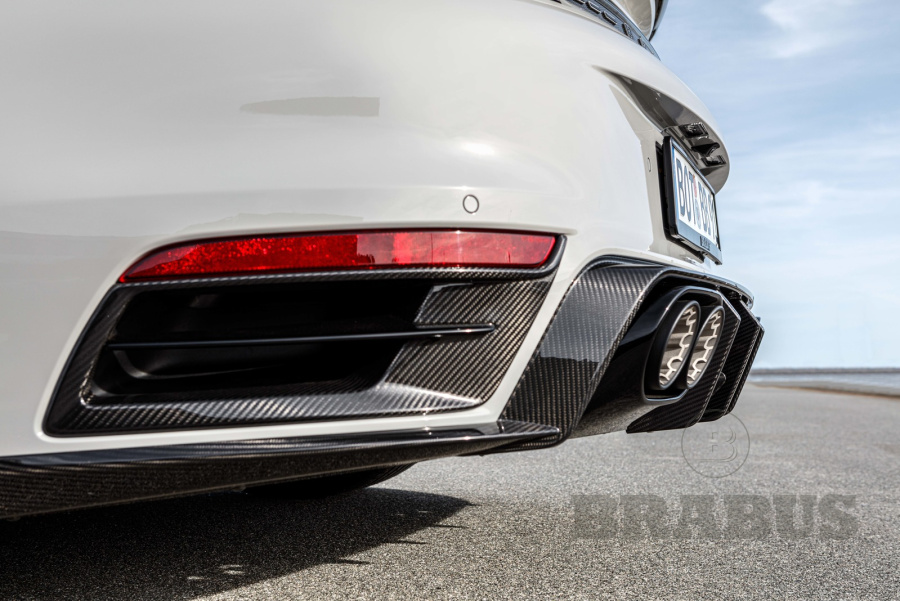 Боковые вставки в задний бампер. Карбон (глянцевый)